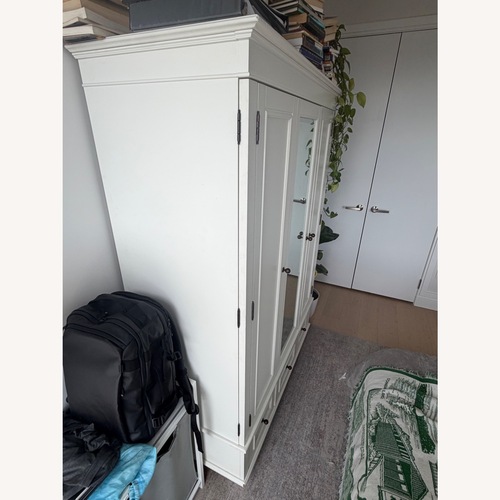 Used White Wood Armoire for sale on AptDeco