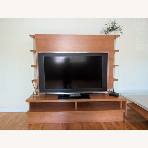 Used Natural Wood TV Stand with Side Displays for sale on AptDeco