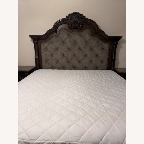 Used Ashley Furniture Dark Brown Maylee King Upholstered Bed for sale on AptDeco