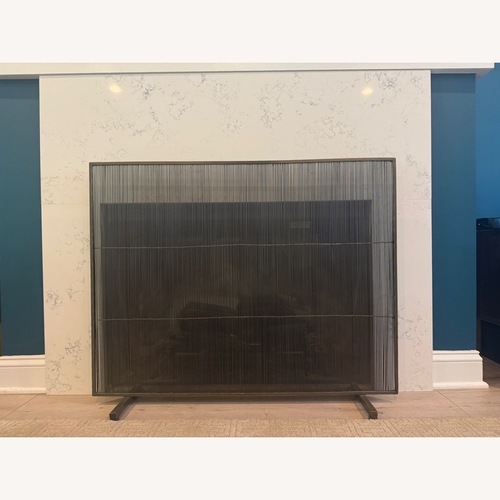 Used Crate & Barrel Antiqued Brass Fireplace Screen for sale on AptDeco