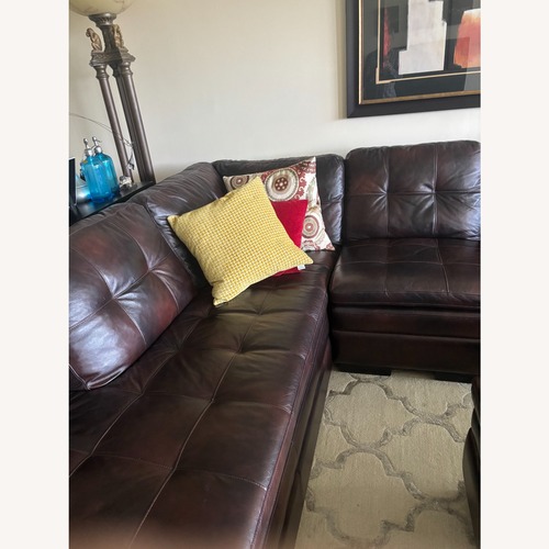 Used Dark Brown Leather 3+ sectional with Ottoman for sale on AptDeco