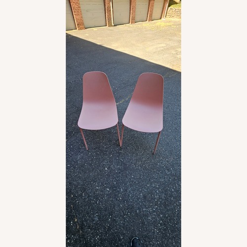 Used Article Svelti Pink Plastic Dining Chairs for sale on AptDeco