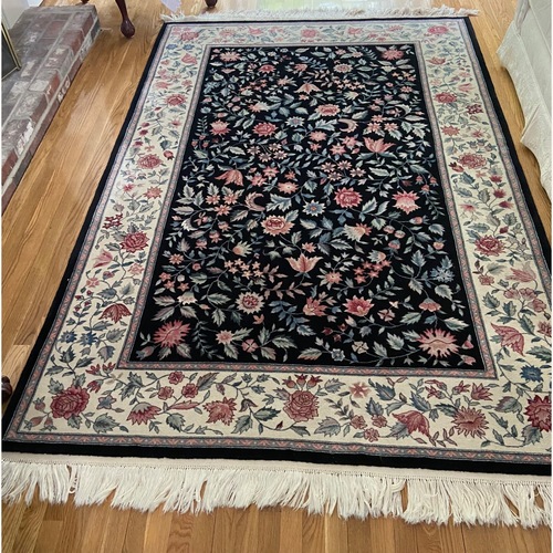 Used Wool Area Rug 5.5' x 8.5' for sale on AptDeco