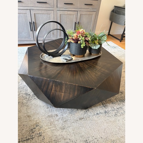 Used Uttermost Kane Dark Brown Wood Coffee Table for sale on AptDeco