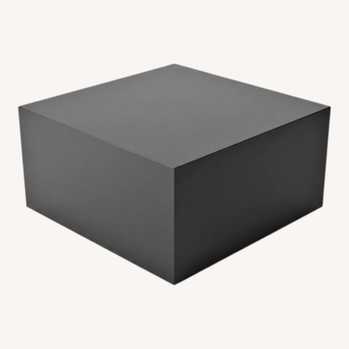 Used Ligne Roset Black Glass Coffee Table for sale on AptDeco