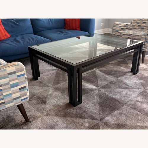Used Black Wood Coffee Table for sale on AptDeco