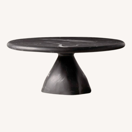 Used CB2 Espira 35" Round Black Marbled Resin Coffee Table for sale on AptDeco