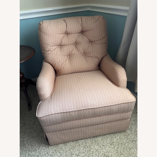 Used Norwalk Sara Peach Fabric Swivel Recliner for sale on AptDeco