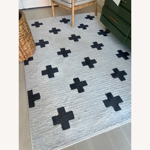 Used Erath Area Rug White Area Rug 5' x 7' for sale on AptDeco