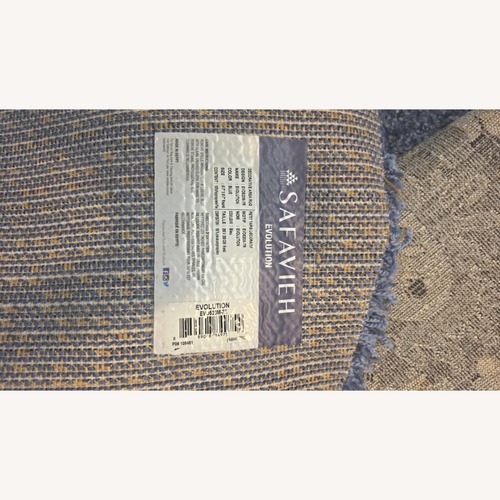Used 6ft Round Thick Blue Shag Area Rug for sale on AptDeco