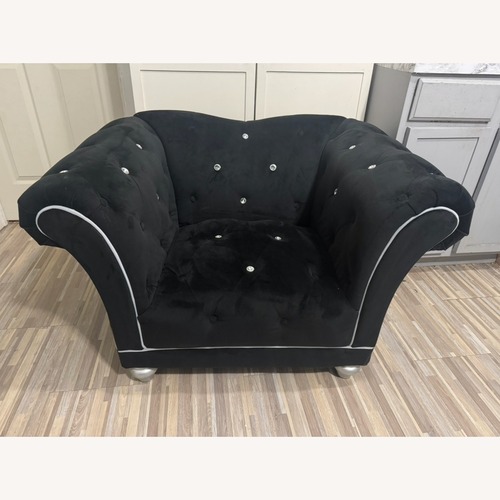 Used Rooms To Go Black Velvet Armchair for sale on AptDeco