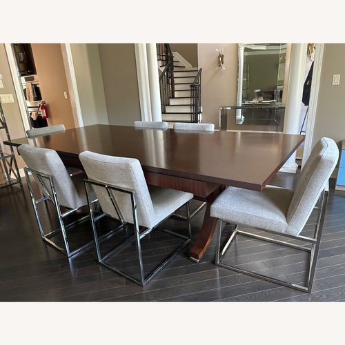 Used Safavieh Couture Dark Brown Dining Table for sale on AptDeco