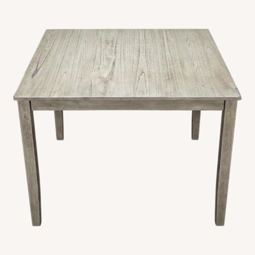 Used Modern Gray Dining Table with 4 Chairs for sale on AptDeco