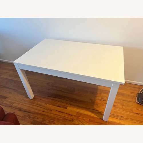 Used IKEA Laneberg White Wood Dining Table for sale on AptDeco