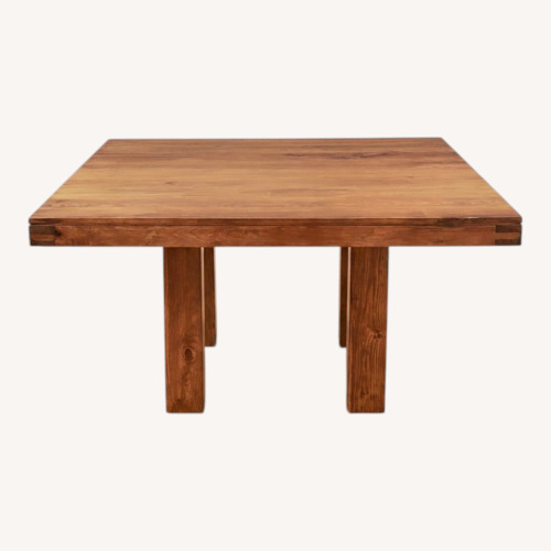 Used Dark Brown Wood Dining Table for sale on AptDeco