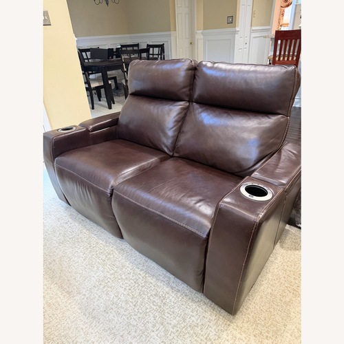 Used Macy’s Dark Brown Leather Power Reclining Sofa  for sale on AptDeco