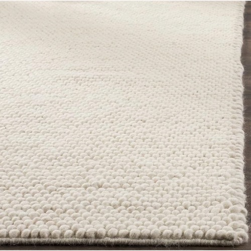 Used Safavieh Natural Wool Area Rug 4' x 6' for sale on AptDeco