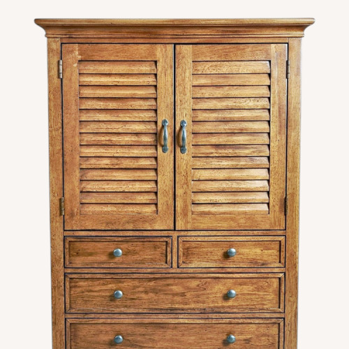 Used Ethan Allen Dark Brown Wood Armoire for sale on AptDeco