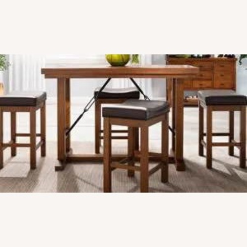 Used Raymour & Flanigan Studio/Apartment Industrial Look Wood Table for sale on AptDeco