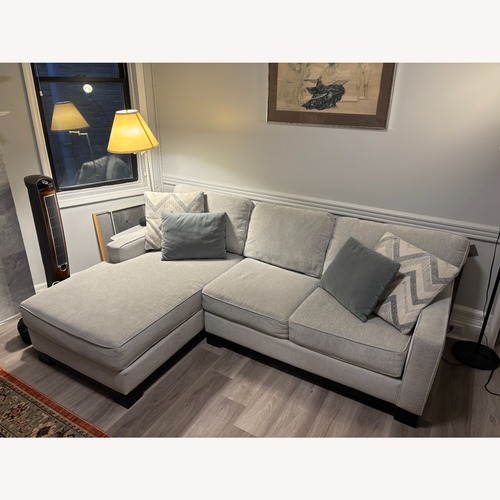 Used Raymour & Flanigan Light Gray 2 Piece Sectional for sale on AptDeco