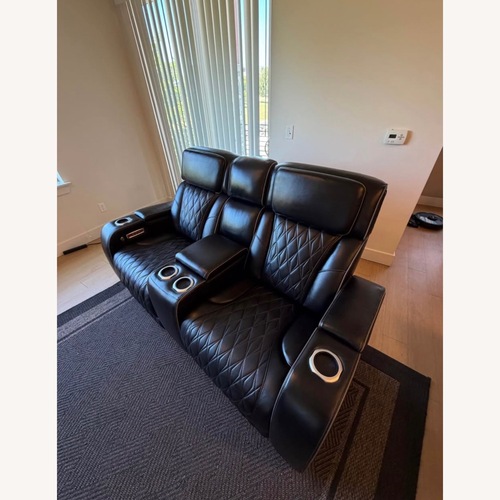Used Ashley Black Leather Recliner for sale on AptDeco