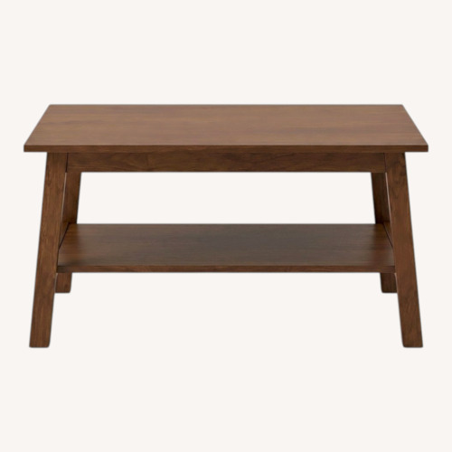 Used IKEA Dark Brown Wood Coffee Table for sale on AptDeco