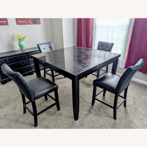 Used Black Marble Dining Table for sale on AptDeco