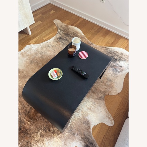 Used Black Wood Coffee Table for sale on AptDeco