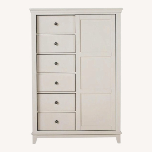 Used Raymour & Flanigan Kylie Wood Armoire for sale on AptDeco