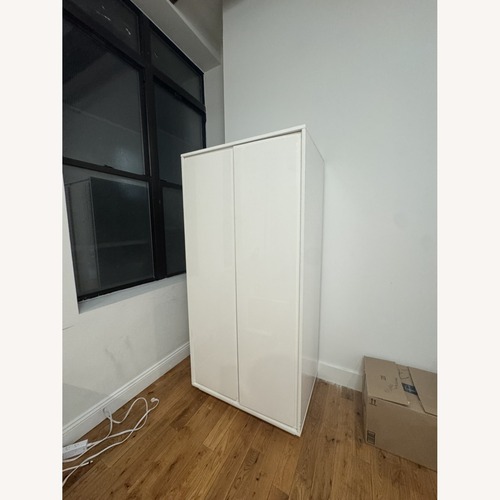 Used CB2 Gallery White 2-Door Wardrobe for sale on AptDeco