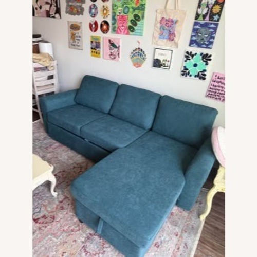 Used Living Spaces Samantha Blue Fabric Sleeper Sofa for sale on AptDeco
