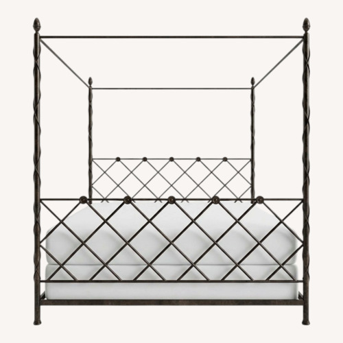 Used Black Iron King Bed for sale on AptDeco