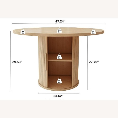 Used Amazon Natural Wood Veneer Dining Table for sale on AptDeco