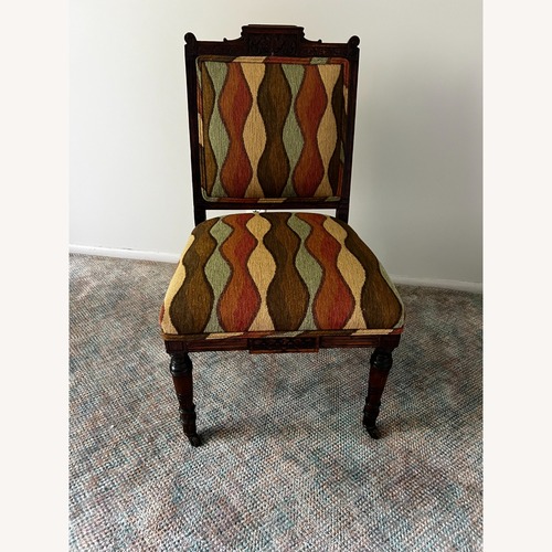 Used Antique Chair with Wheels for sale on AptDeco