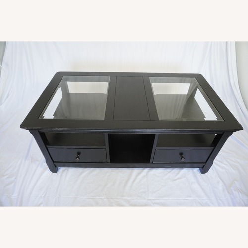 Used Modern Black Coffee Table – Glass Top, 2 Drawers for sale on AptDeco