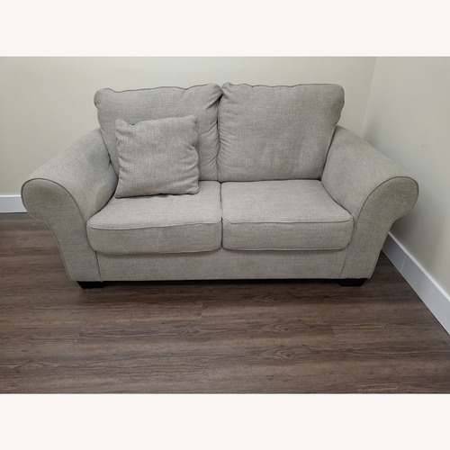Used Ashley Furniture Belcampo Light Gray Loveseat for sale on AptDeco