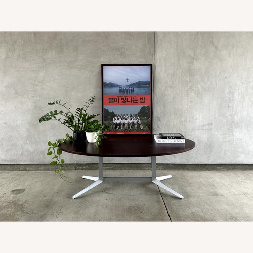 Used MCM Vintage Dark Brown Round Oval Table for sale on AptDeco