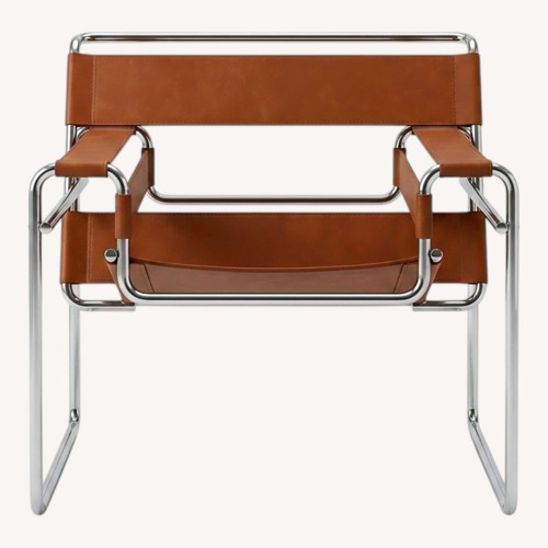Used Vintage/Antique Finds Dark Brown Leather Armchair for sale on AptDeco