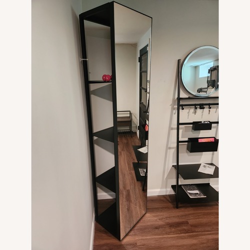 Used Pottery Barn Temple Street Storage Mirror for sale on AptDeco