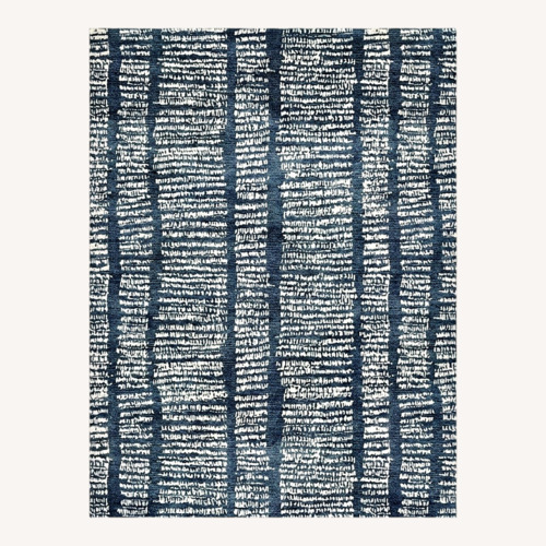 Used Sutherland Perennial Black Area Rug 9' x 12' for sale on AptDeco