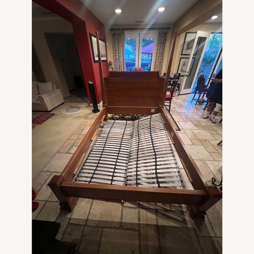 Used Michael's Furniture Company Solid Wood Queen Bed for sale on AptDeco