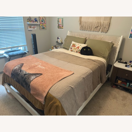 Used Anthropologie Carved Thalia Queen Bed for sale on AptDeco