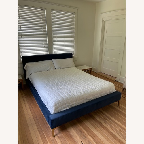 Used Navy Blue Velvet Upholstered Queen Platform Bed for sale on AptDeco