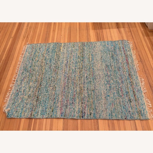 Used Hand Woven Bright Blue Multi 4x6 Area Rug for sale on AptDeco