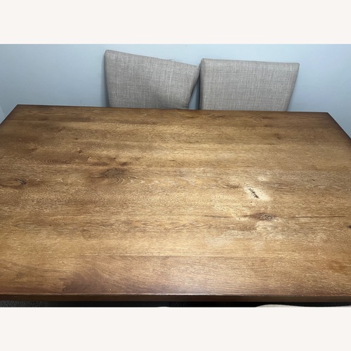 Used Natural Wood Dining Table for sale on AptDeco