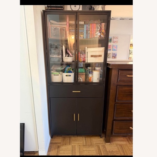 Used Black Wood Tall Armoire  for sale on AptDeco