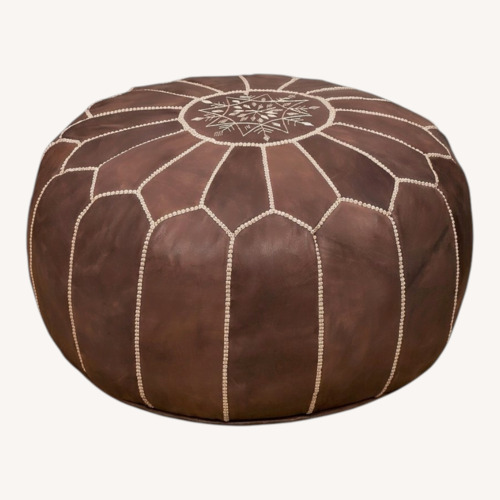 Used Pottery Barn Nadia Moroccan-Style Leather Pouf for sale on AptDeco