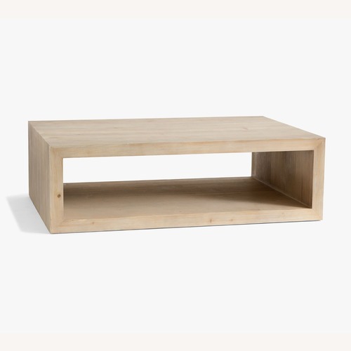 Used Pottery Barn Folsom Natural Wood Coffee Table for sale on AptDeco