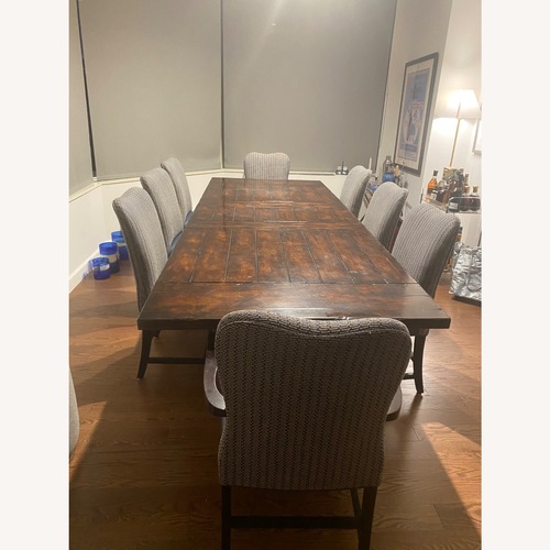 Used Dark Brown Wood Dining Set with 8 Chairs  for sale on AptDeco