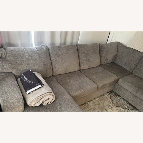 Used Ashley Furniture Light Gray 2 Piece Sectional for sale on AptDeco